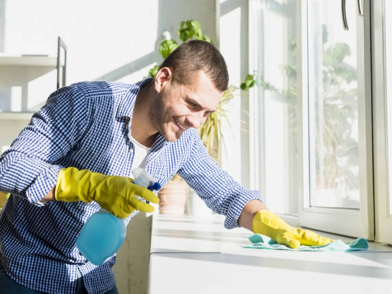 man-cleaning-his-home-scaled